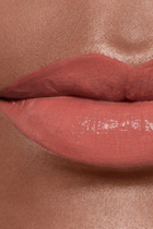 أحمر شفاه مرطب ومعزز للامتلاء. لمعان ولون طويل الثبات مكثف ROUGE COCO BLOOM