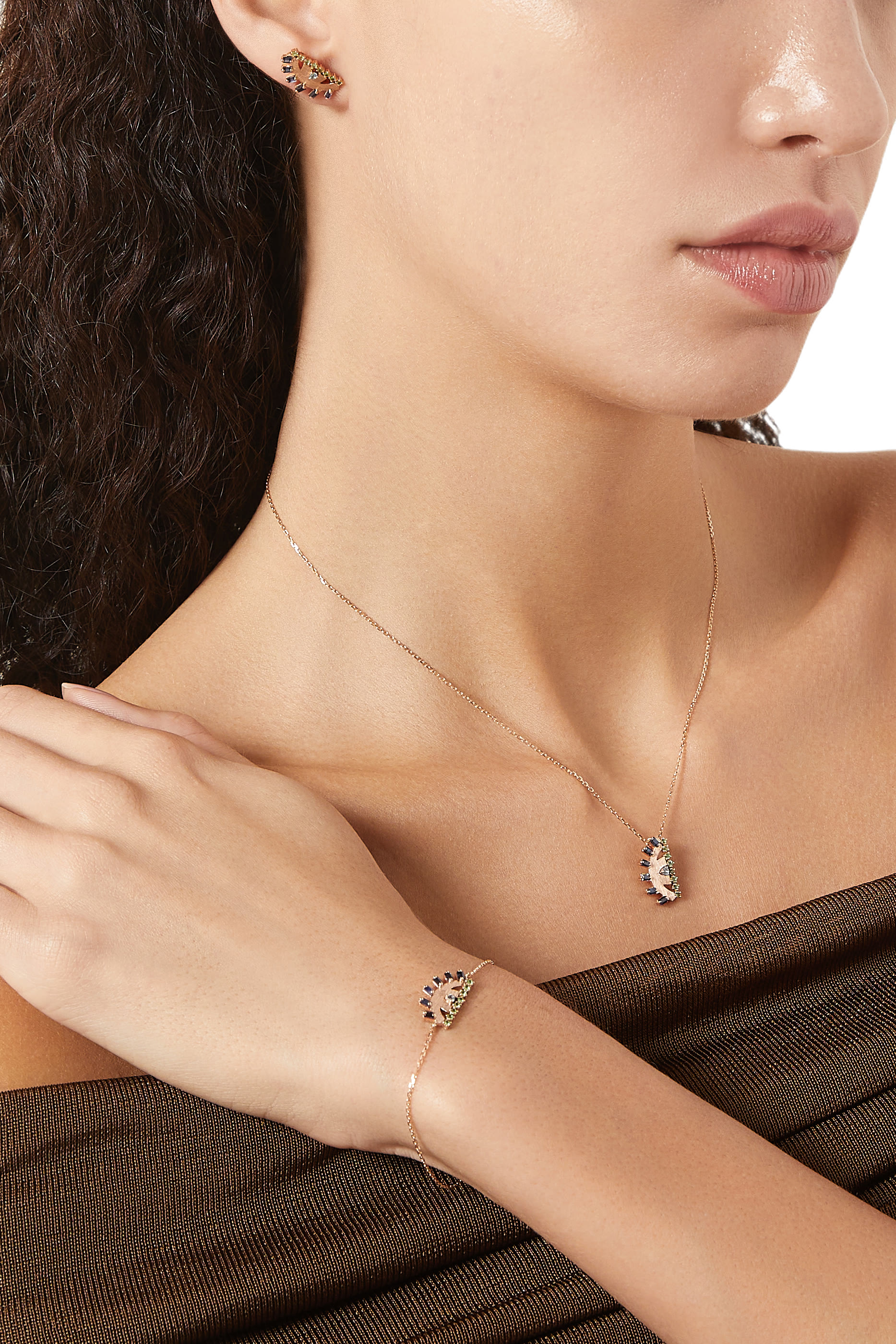 سوار بحلية عين مرصعة بالتوباز والزمرد والياقوت، ذهب وردي عيار 18