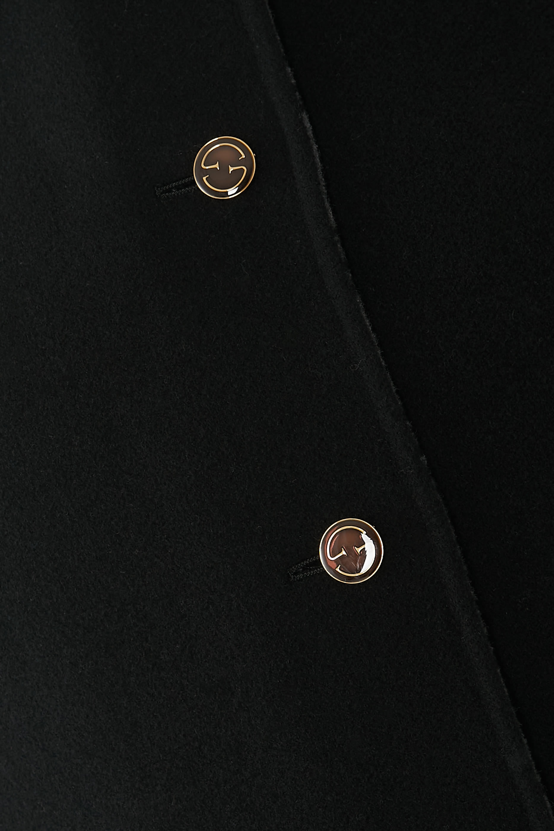 جاكيت بتصميم وجهين ونقشة حرفي شعار الماركة صوف