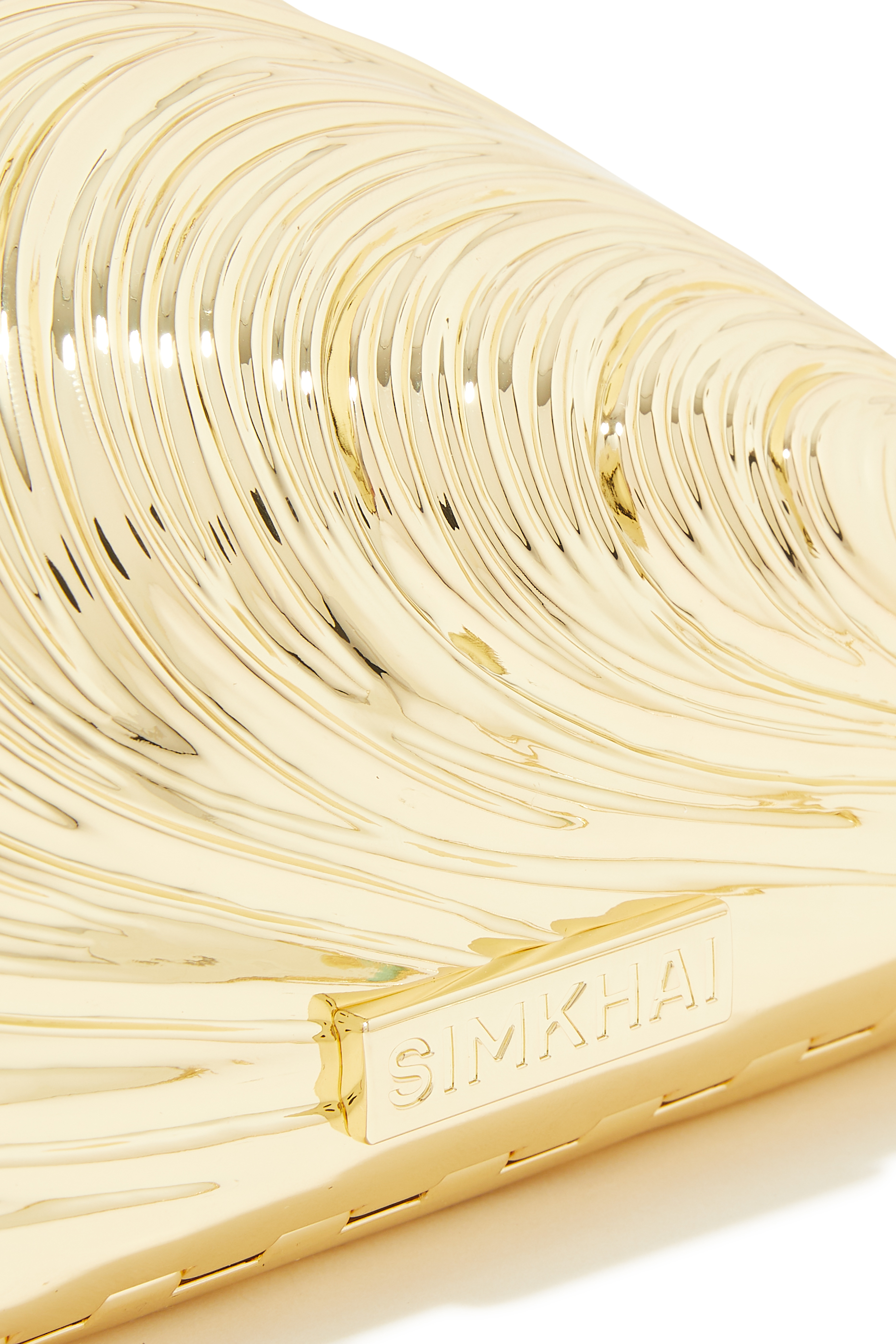 كلاتش بريدجت معدني بتصميم صدفة كلاتش بريدجت معدني بتصميم صدفة