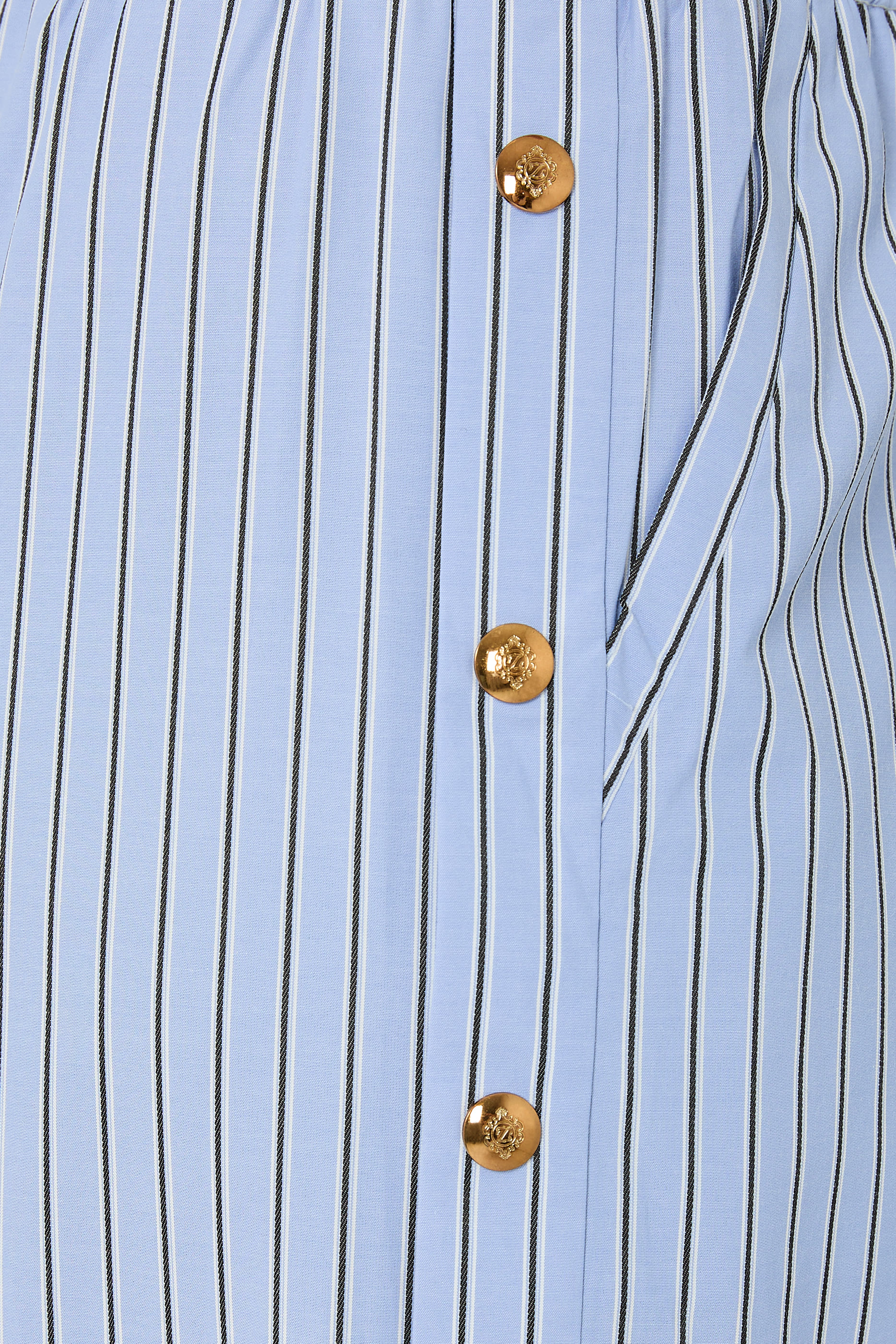 بنطال مخطط بأزرار كبس