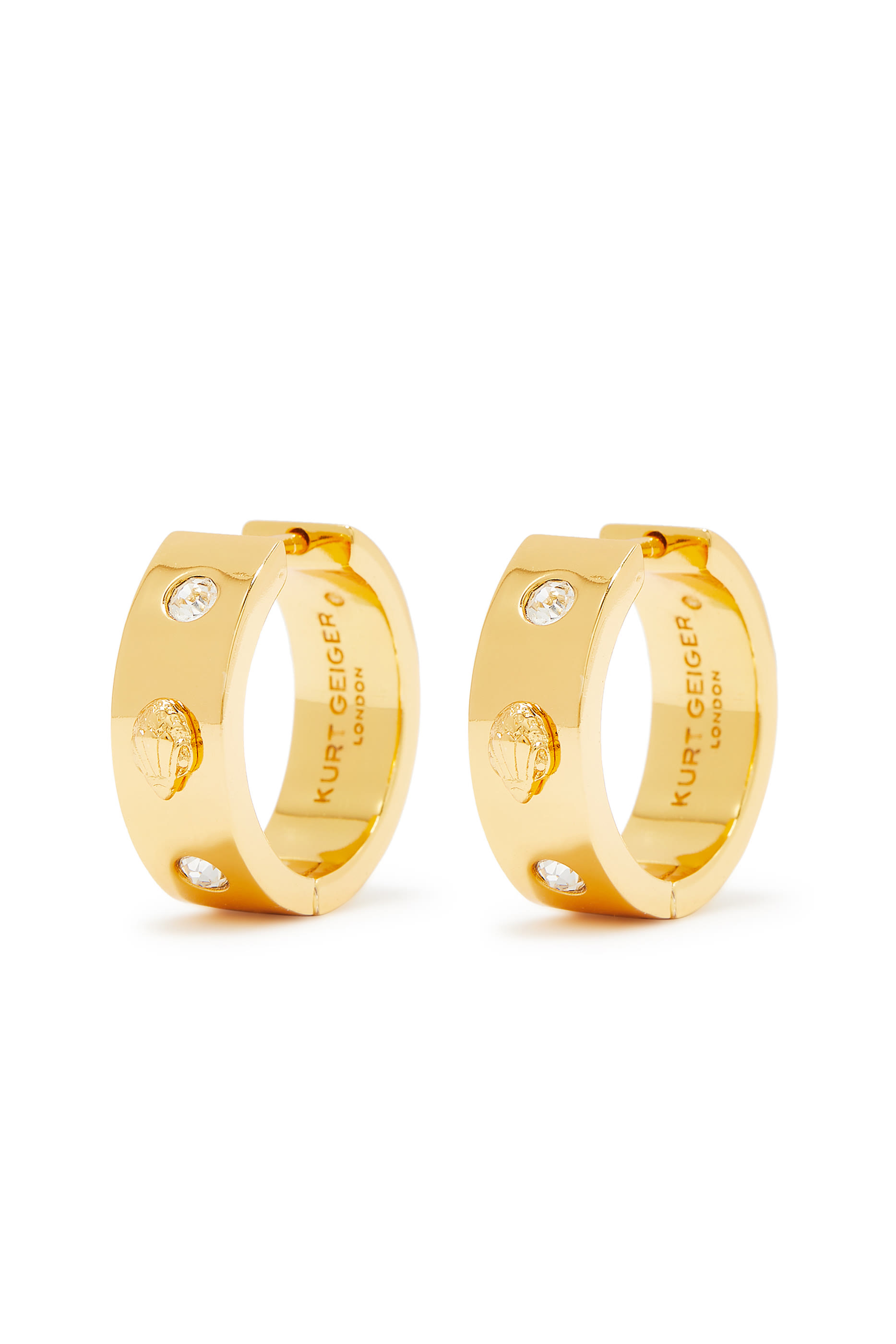 أقراط معدنية دائرية بشعار النسر