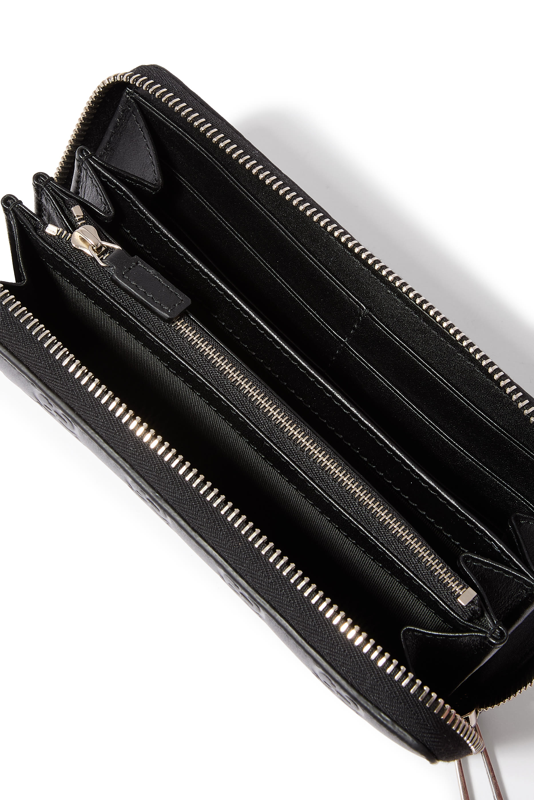 محفظة بسحاب محيط ونقشة حرفي شعار الماركة