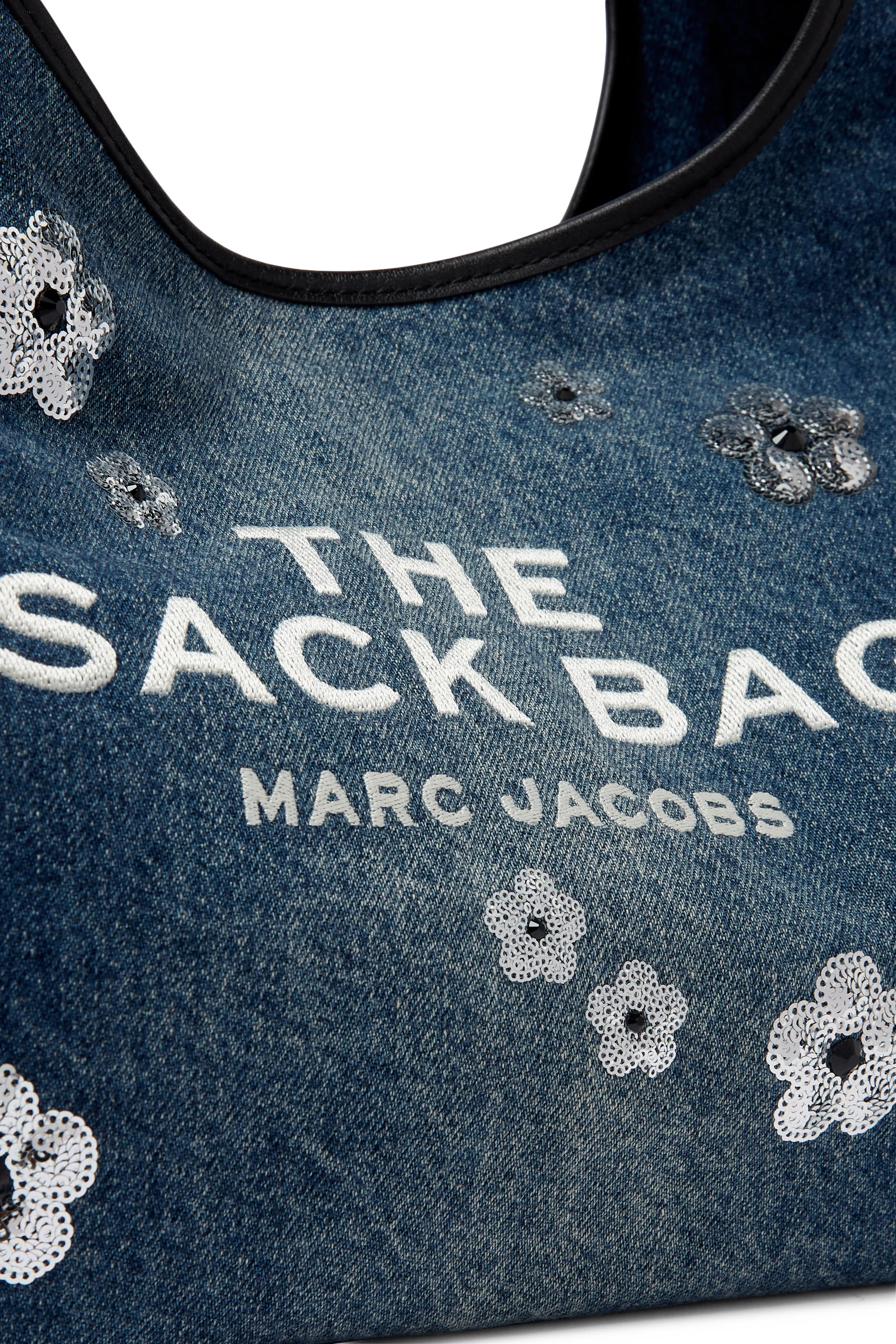 حقيبة ساك بنقشة زهور وتطريزات بالترتر حقيبة ساك بنقشة زهور وتطريزات بالترتر