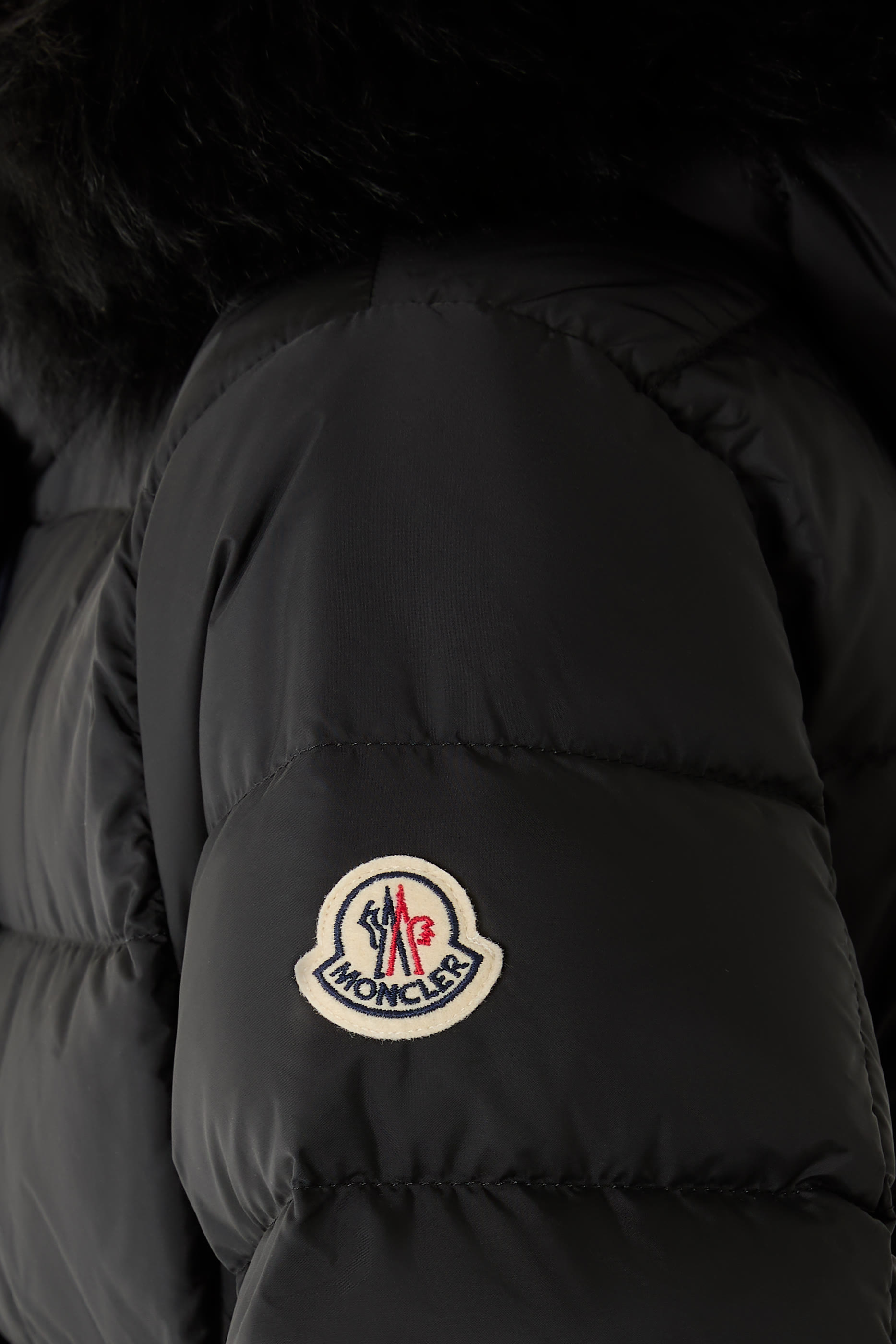 جاكيت كلوس طويل مبطن بالزغب بغطاء رأس بحافة فرو