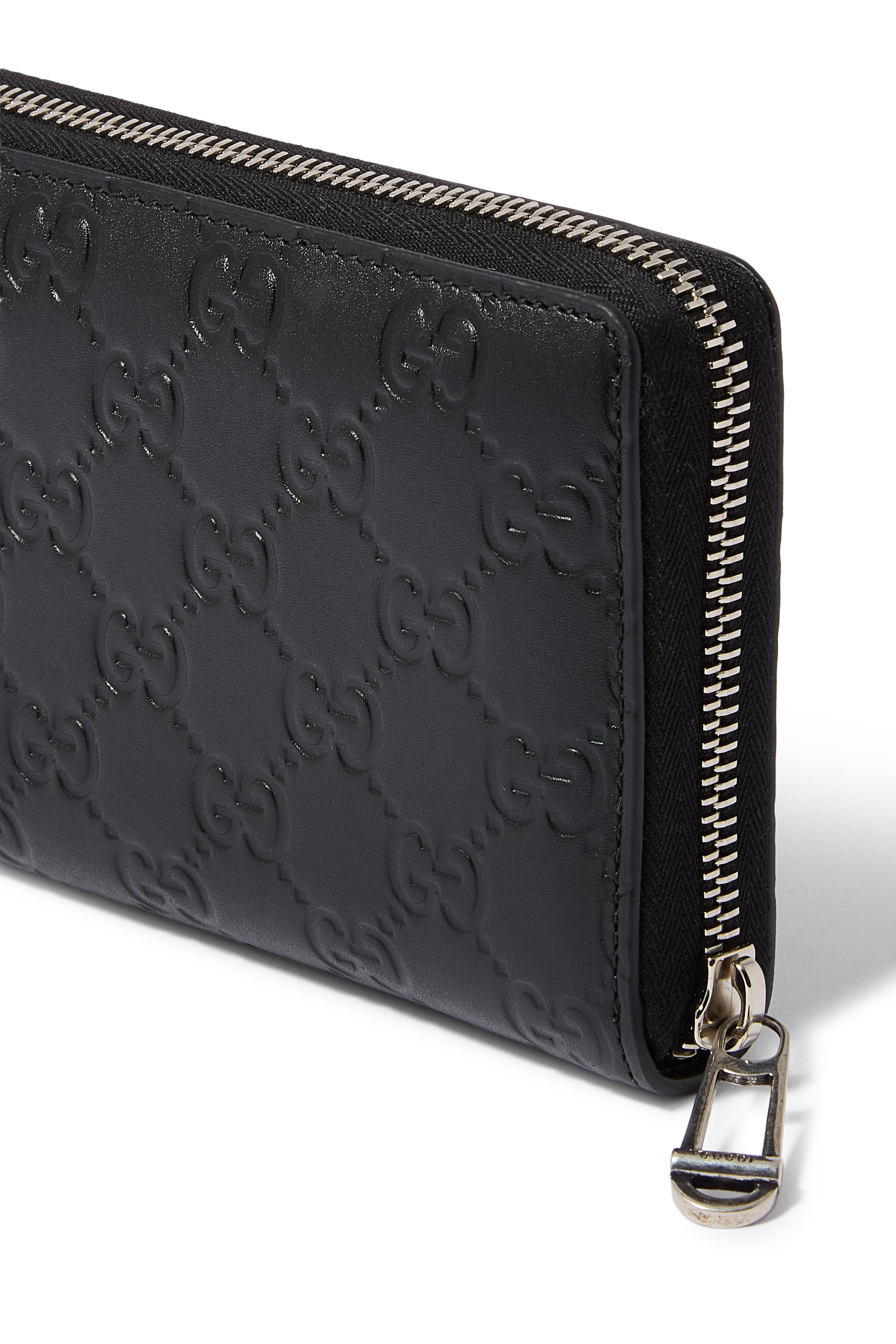 محفظة بسحاب محيط ونقشة حرفي شعار الماركة