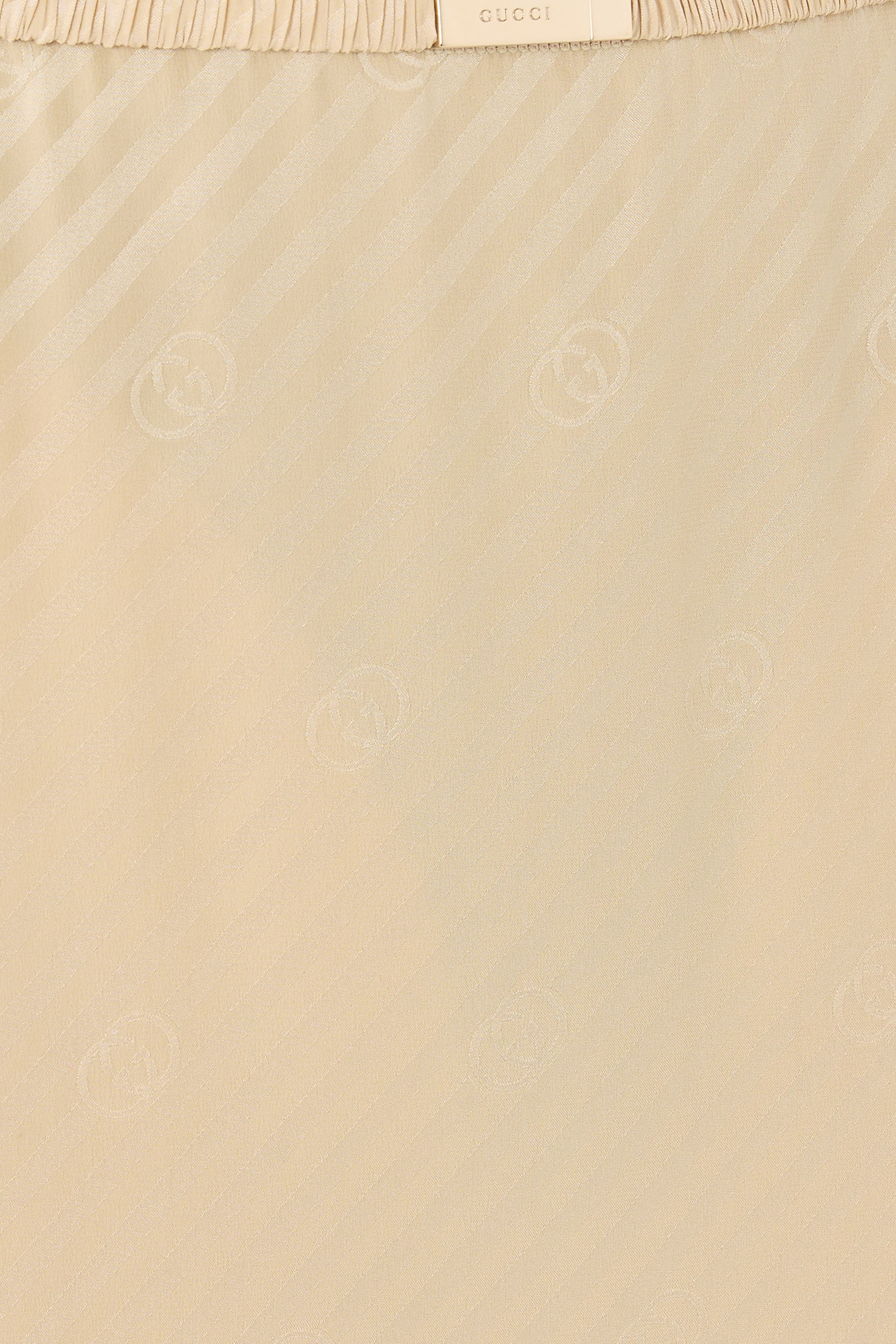 تنورة بنقشة خطوط مائلة وحرفي شعار الماركة حرير جاكار