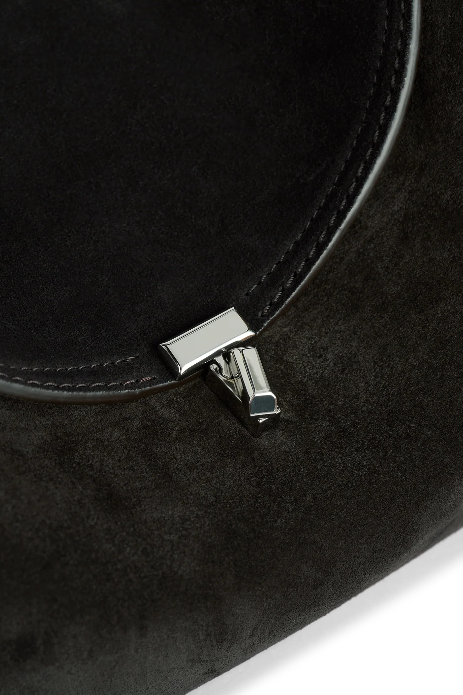 حقيبة بقفل على شكل حرف T ويد علوية شمواه