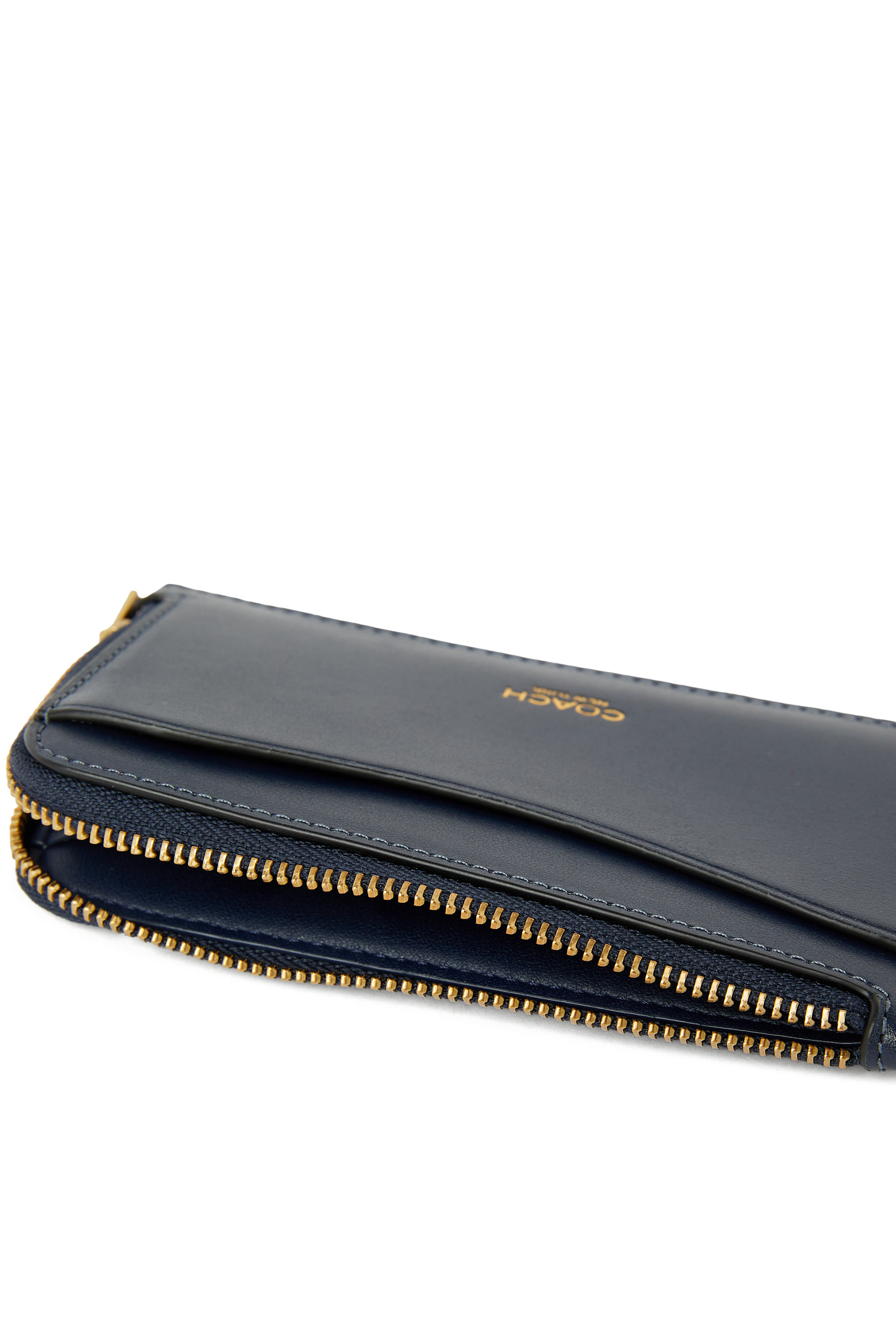 محفظة بسحاب محيط جلد