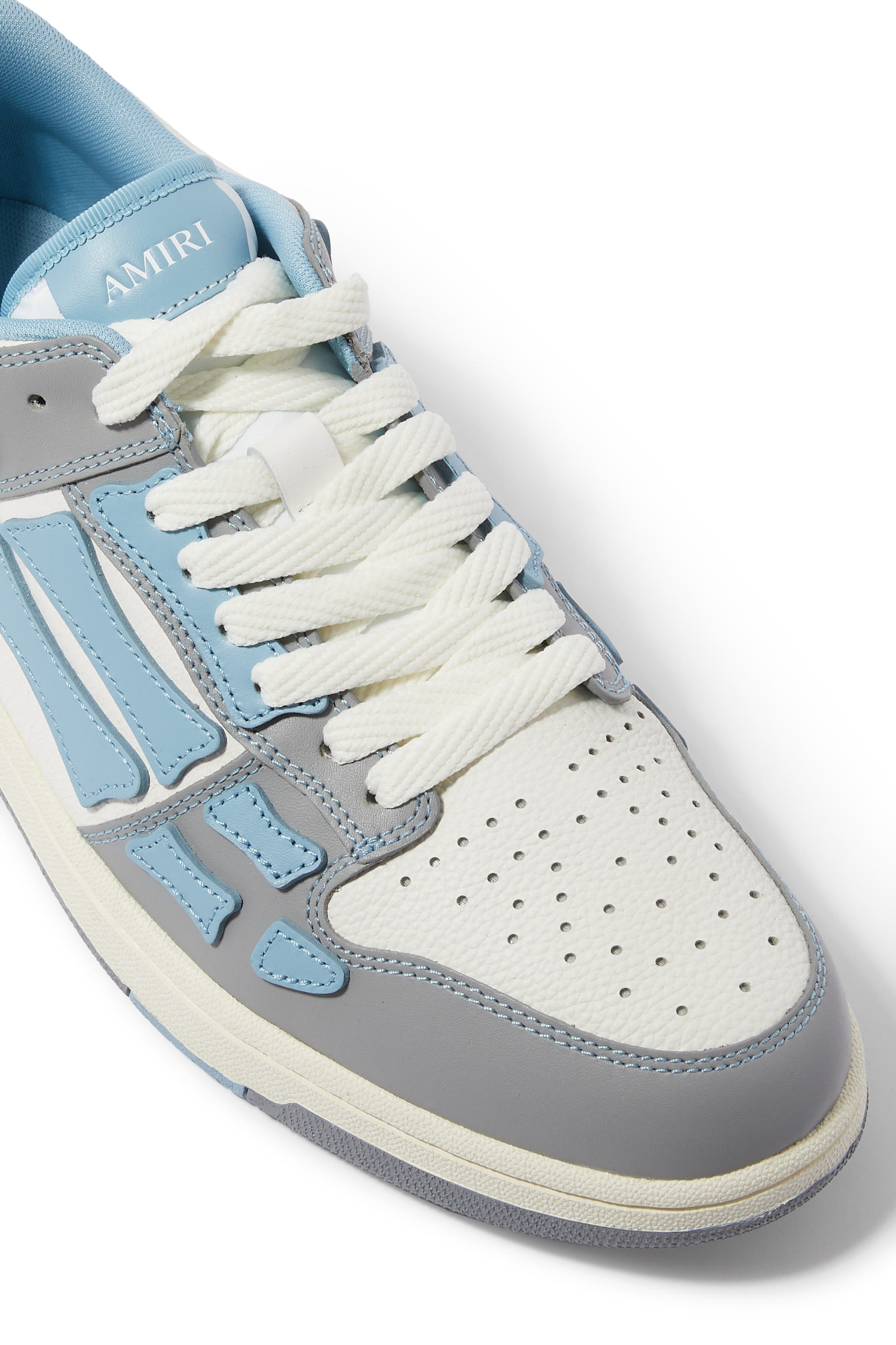 سنيكرز بتصميم جامعي برقع هيكل عظمي