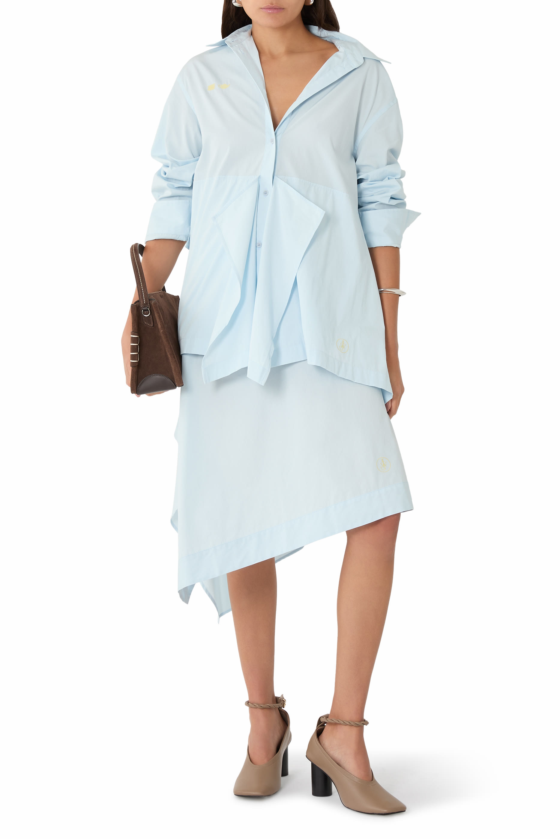 تنورة بتصميم غير متماثل بتفاصيل درابيه