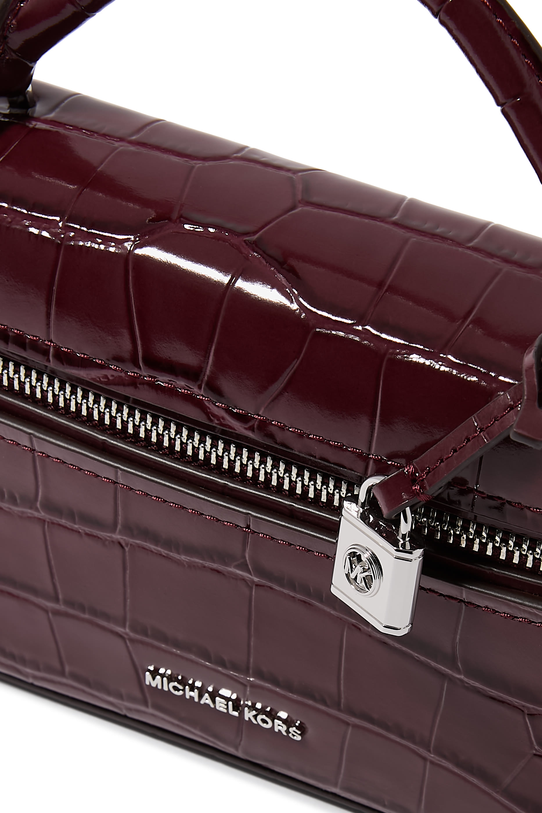 حقيبة كروس بودي جانا صغيرة جلد محفور بنقشة جلد التمساح