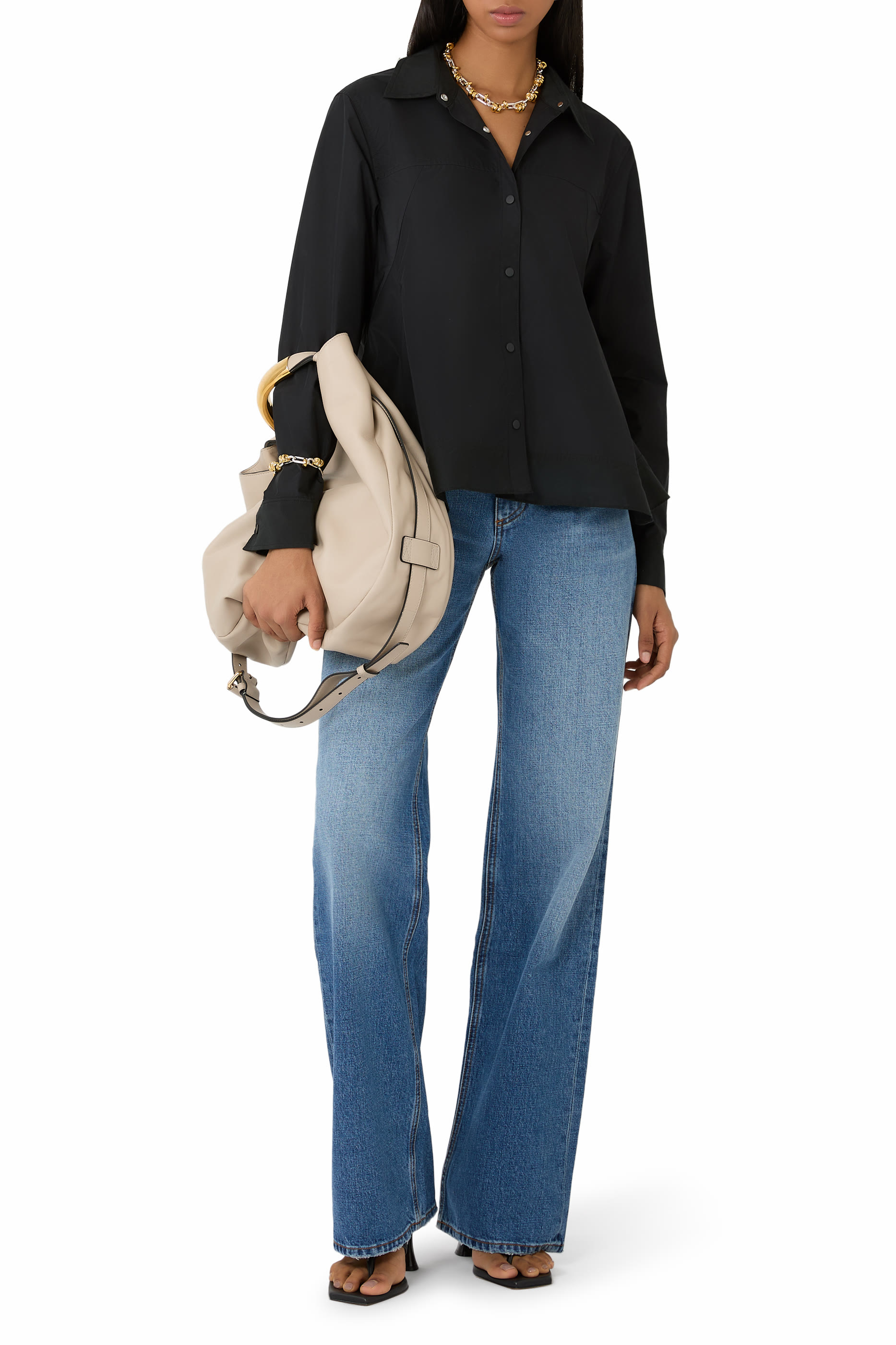 قميص بأكمام طويلة وحواف كشكش