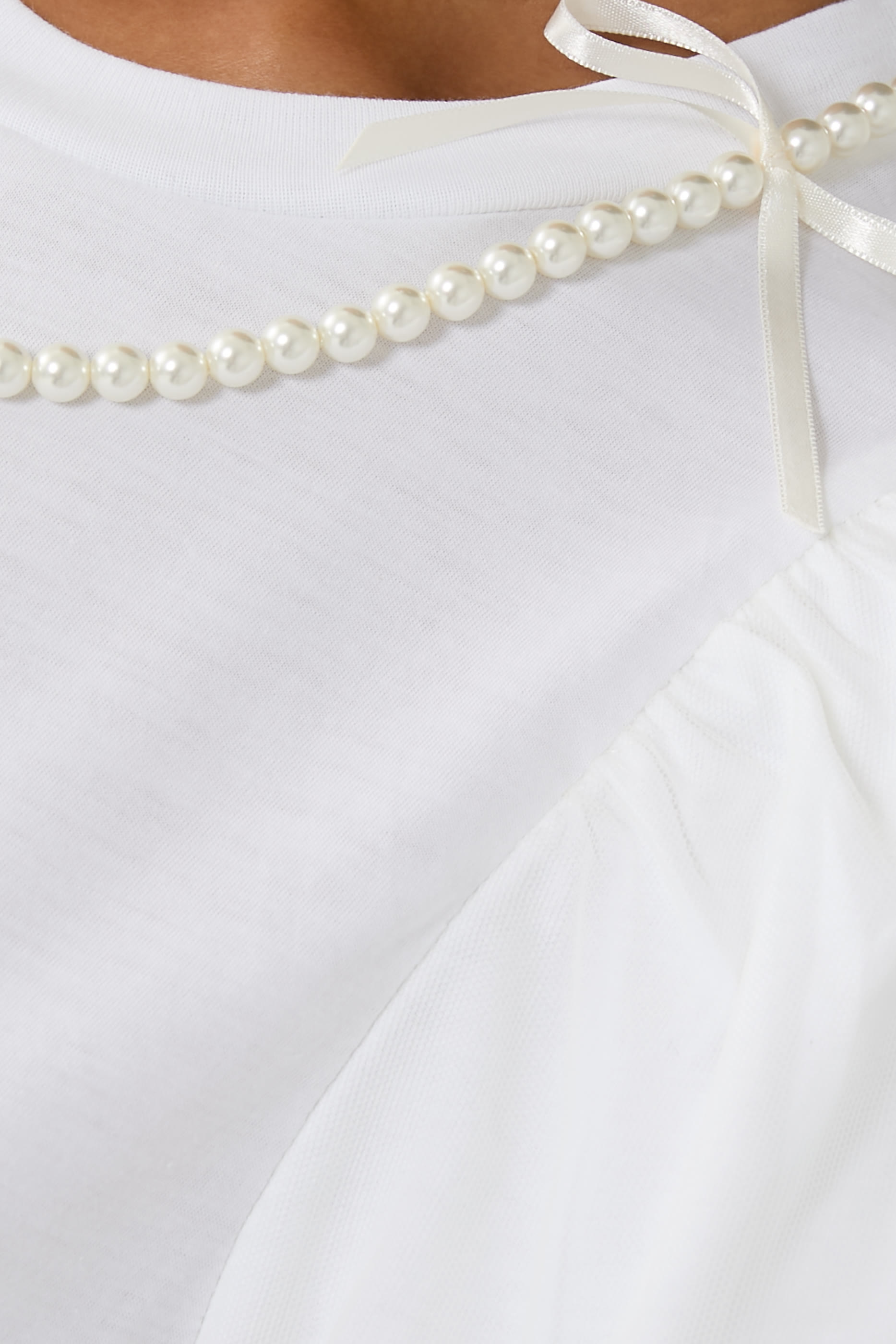 تيشيرت بأكمام منفوخة وطبقة من التول