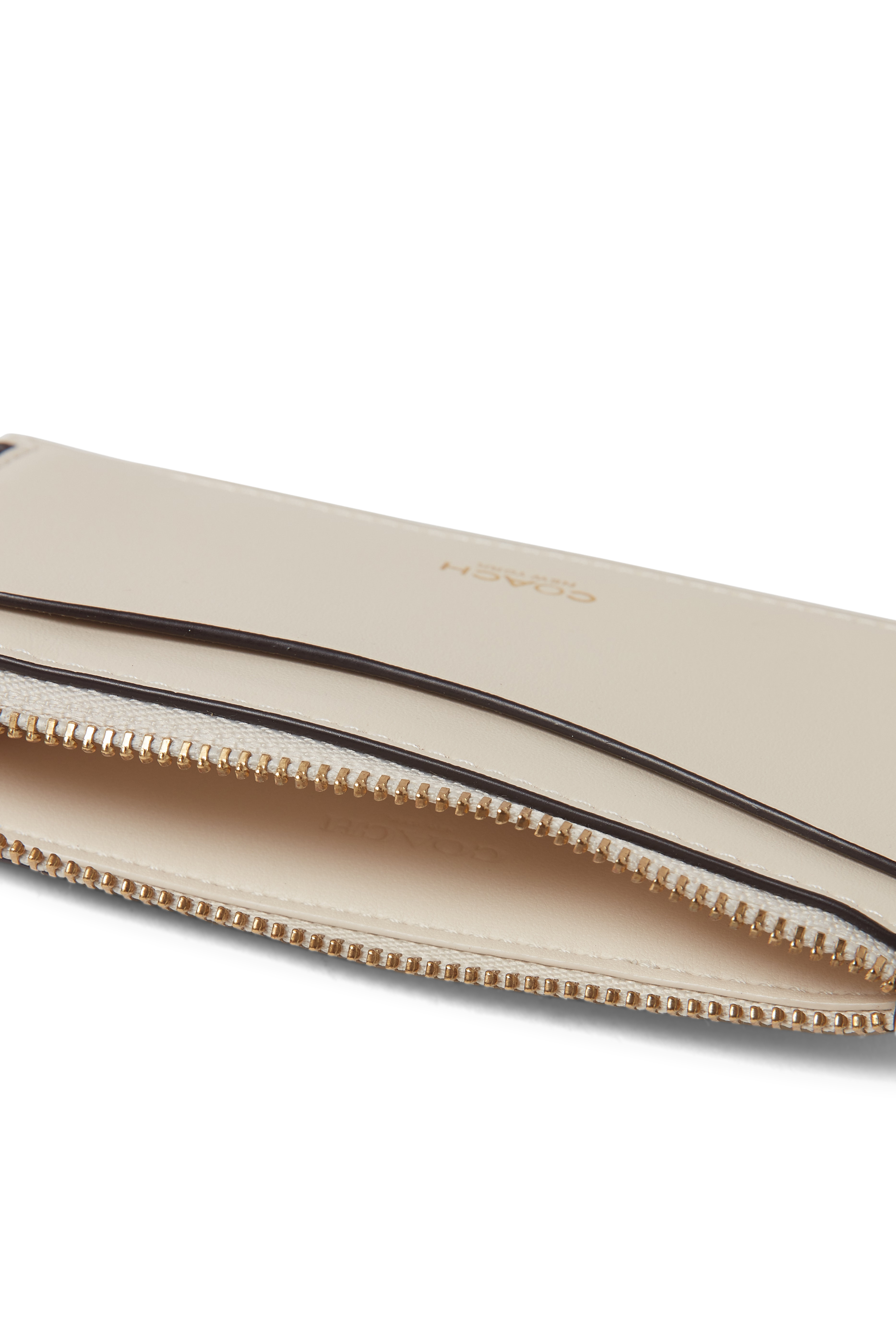 محفظة بسحاب محيط جلد