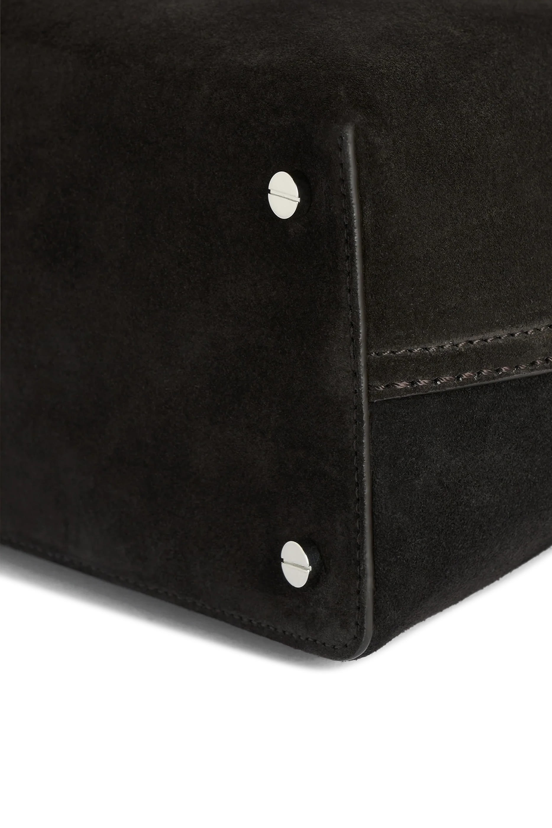 حقيبة بقفل على شكل حرف T ويد علوية شمواه