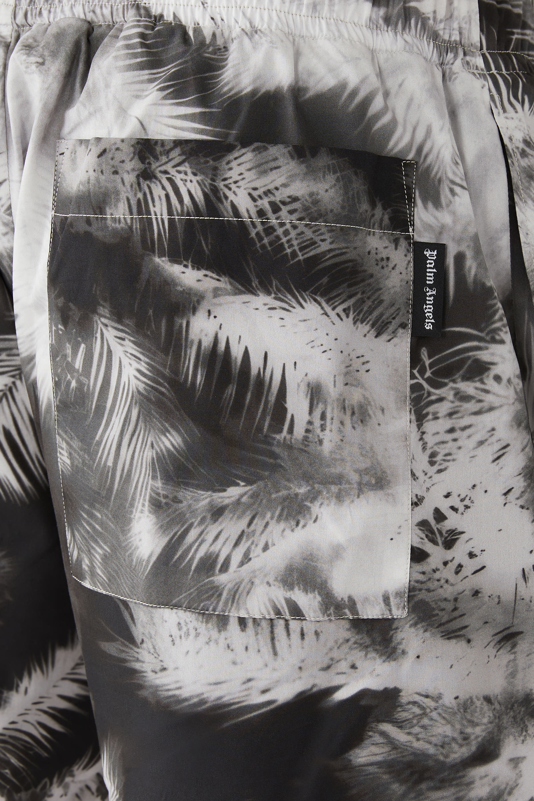 شورت بنقشة نخيل بلون أزرق