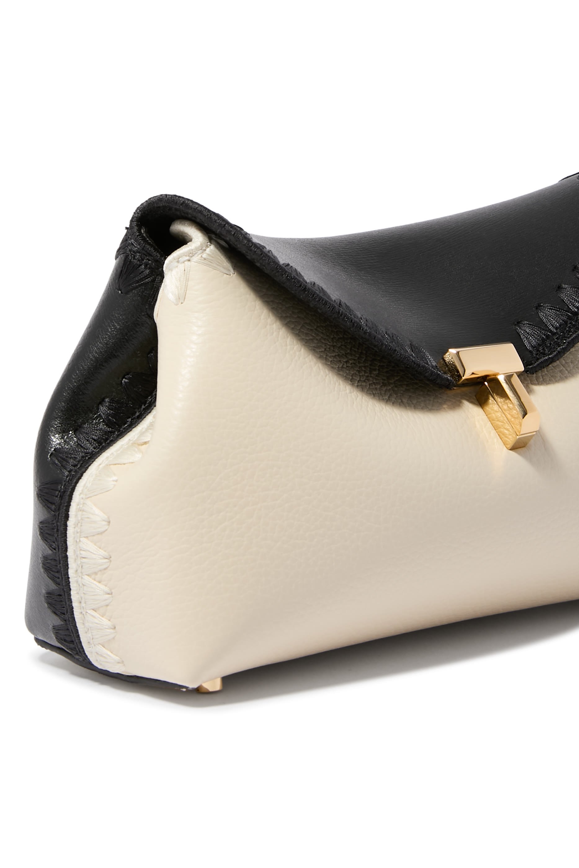 كلاتش صغير بقفل بتصميم حرف T جلد