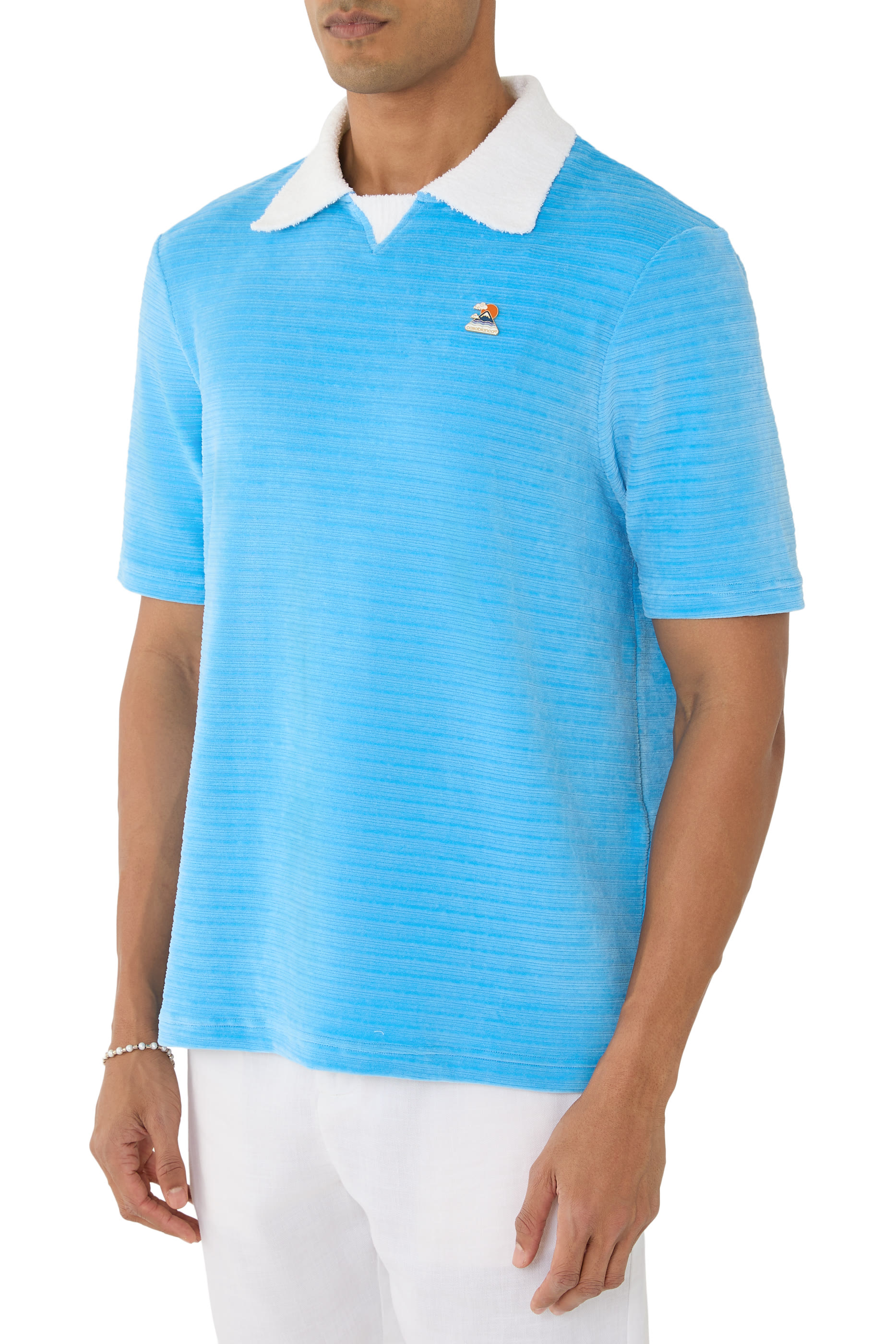 قميص بولو بأكمام قصيرة مخمل