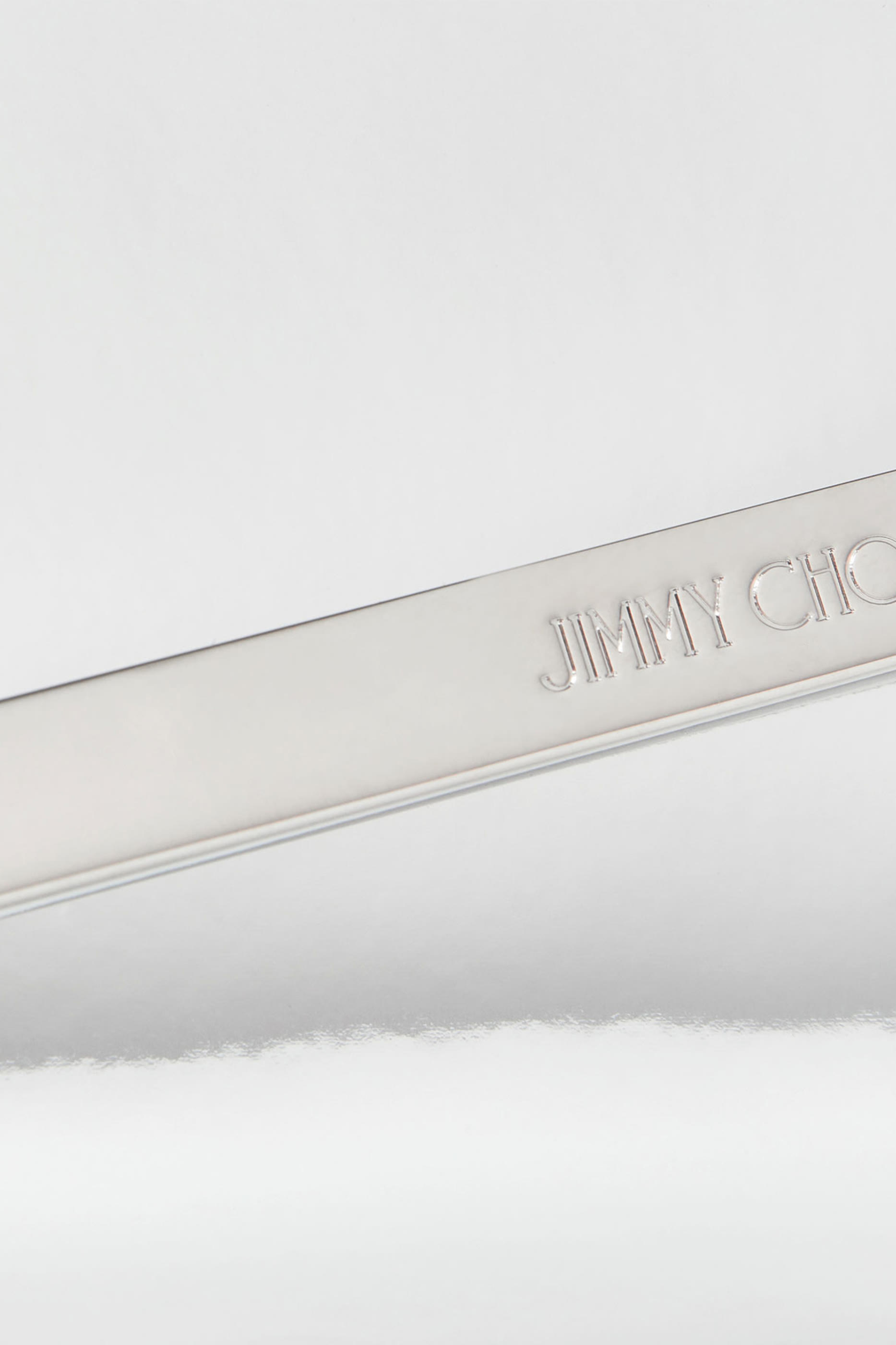 كلاتش إيمي بتصميم ظرف جلد لامع