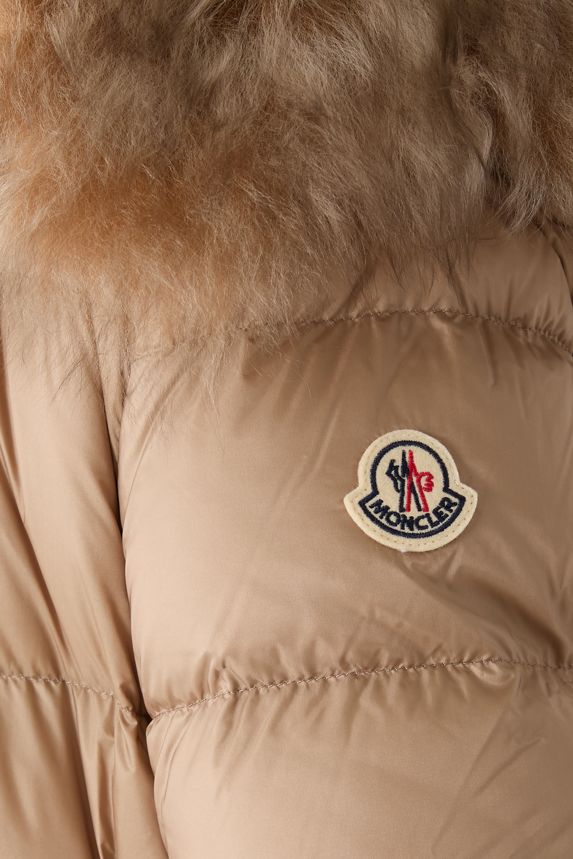 جاكيت بود قصير مبطن بالزغب بحافة فرو