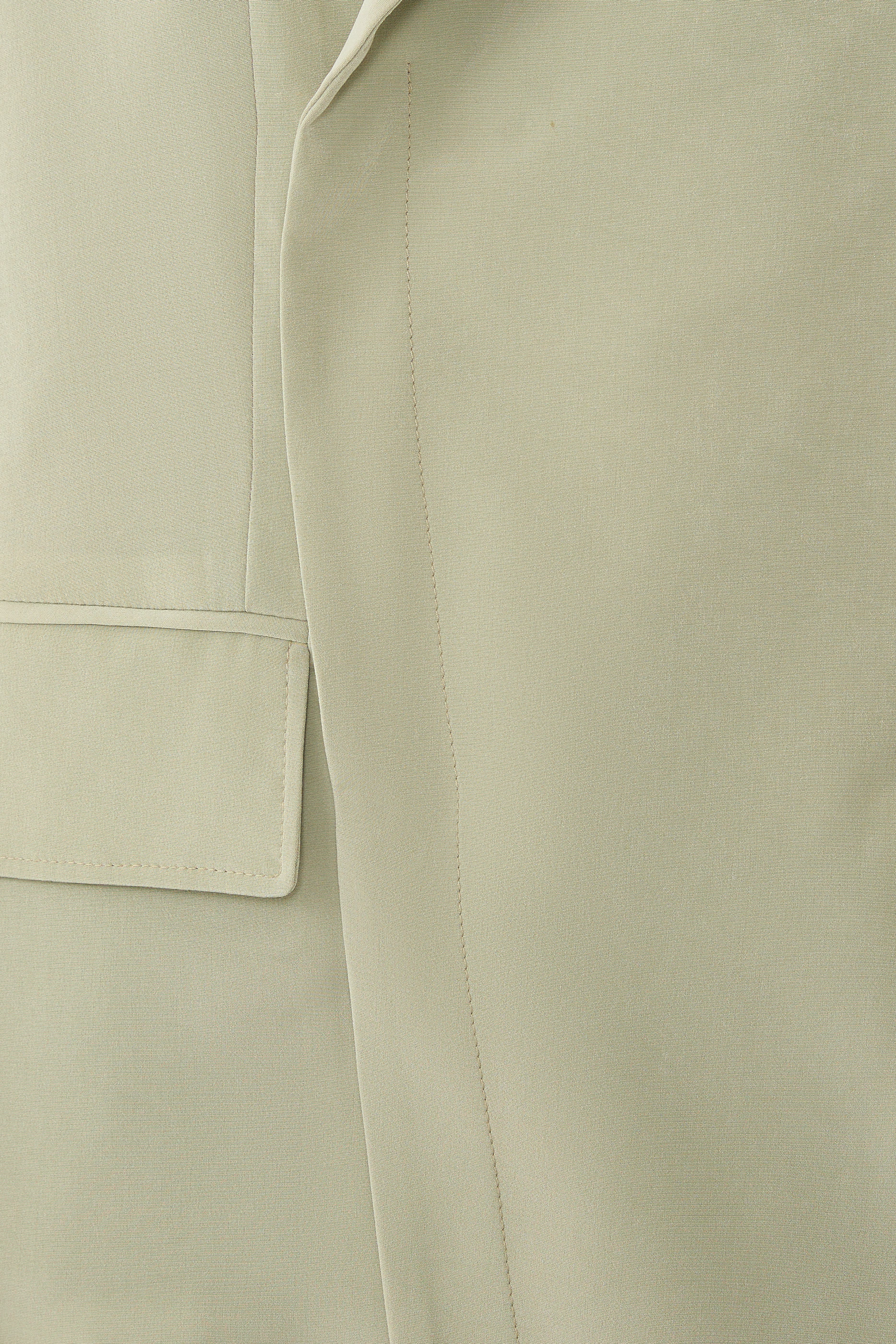 بليزر بدلة بقصة مريحة وتصميم ملفوف غير متماثل