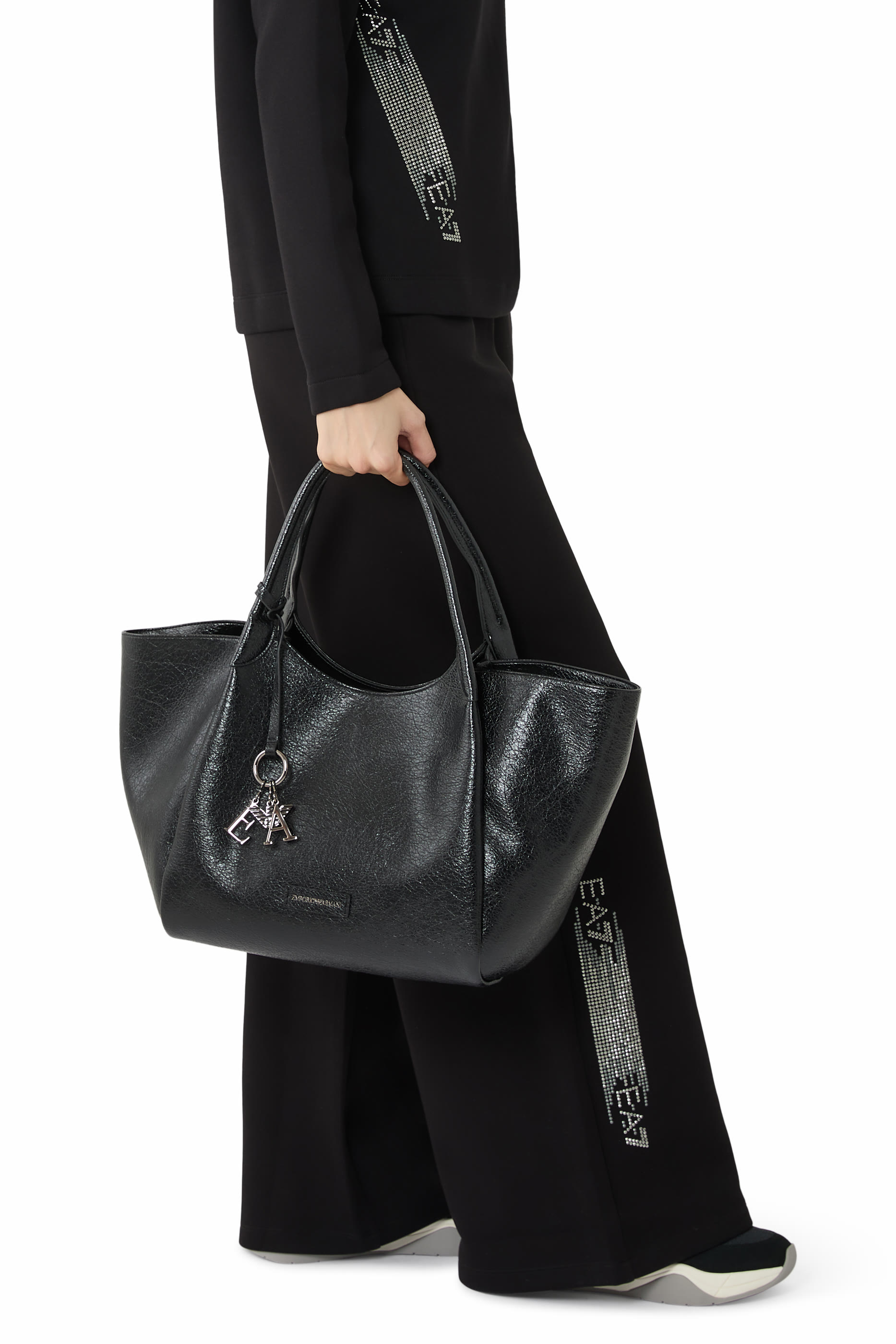 حقيبة يد بحلية شعار الماركة جلد