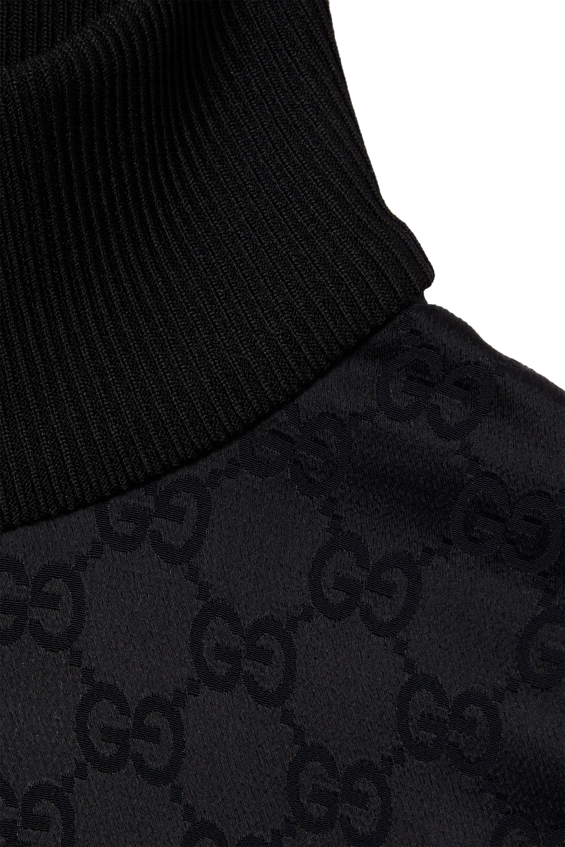 جاكيت بسحاب ونقشة حرفي شعار الماركة جاكار