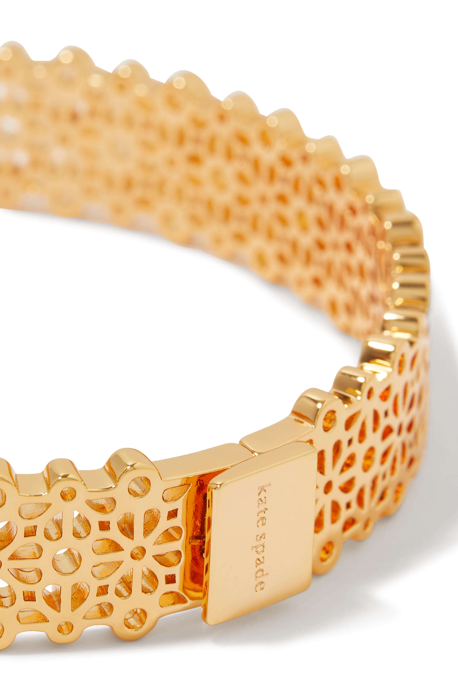 سوار رفيع بفتحات وزهور بالشكل البستوني