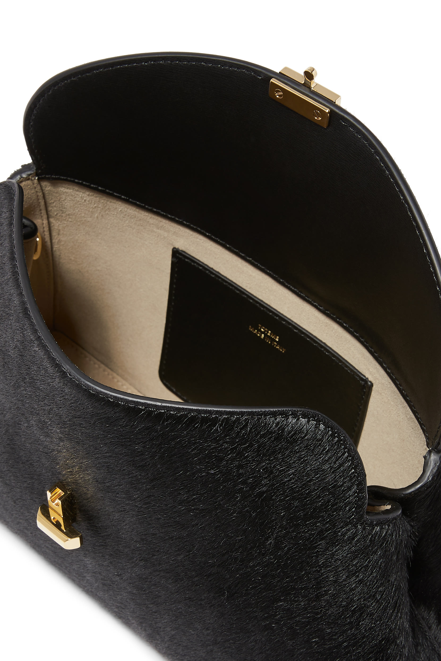 حقيبة كلاتش بقفل على شكل حرف T فرو مهر