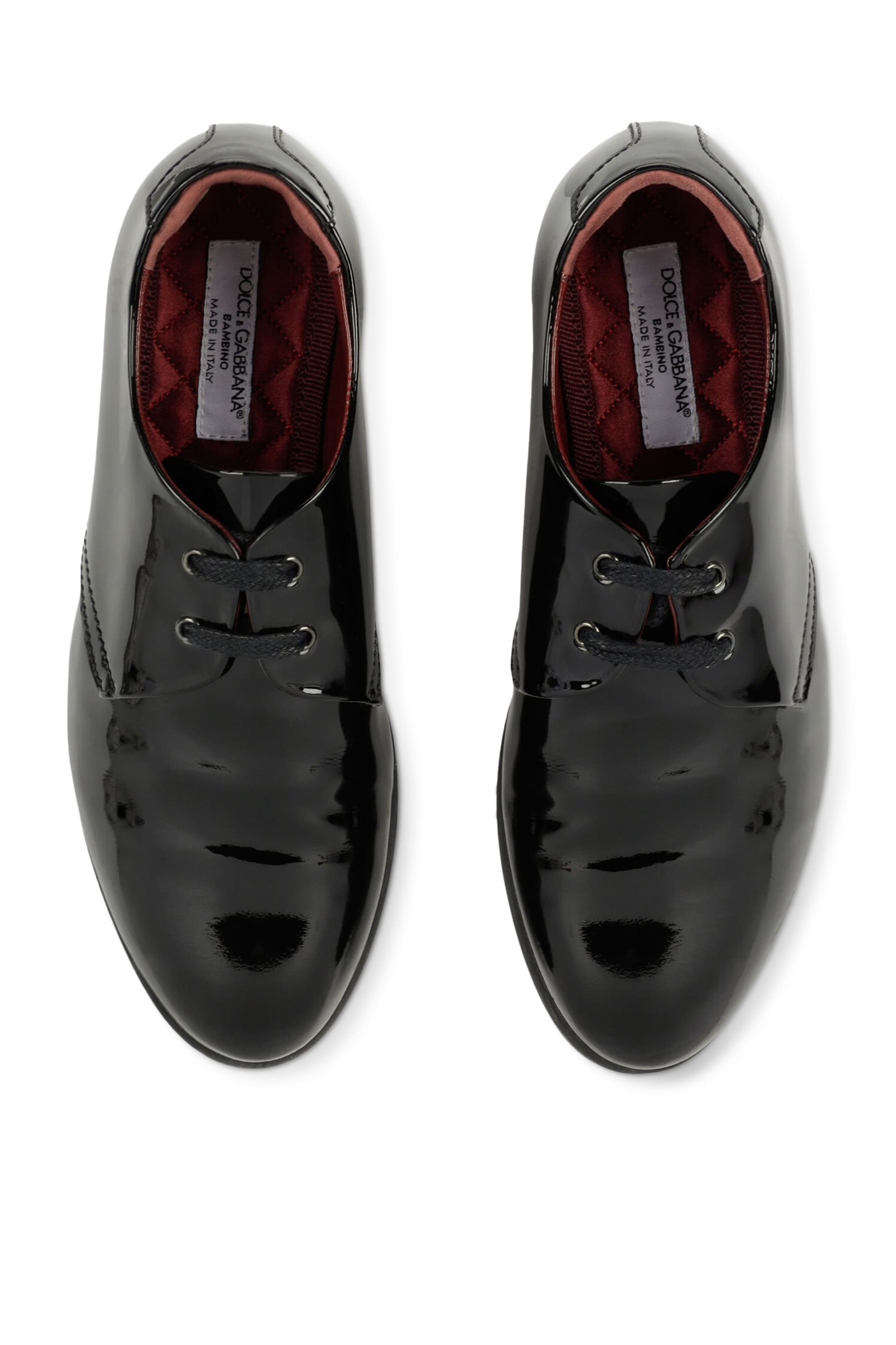 سنيكرز جلد لامع بأربطة للأطفال