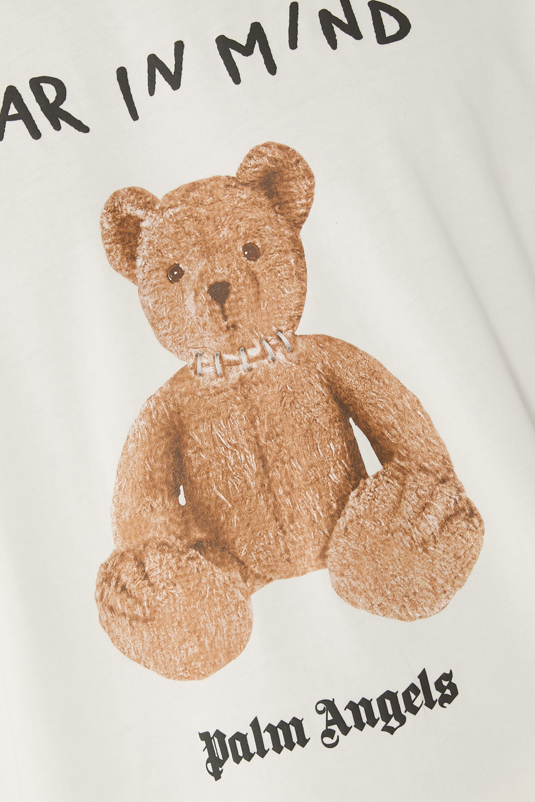 تيشيرت مزين بعبارة بير ان مايند