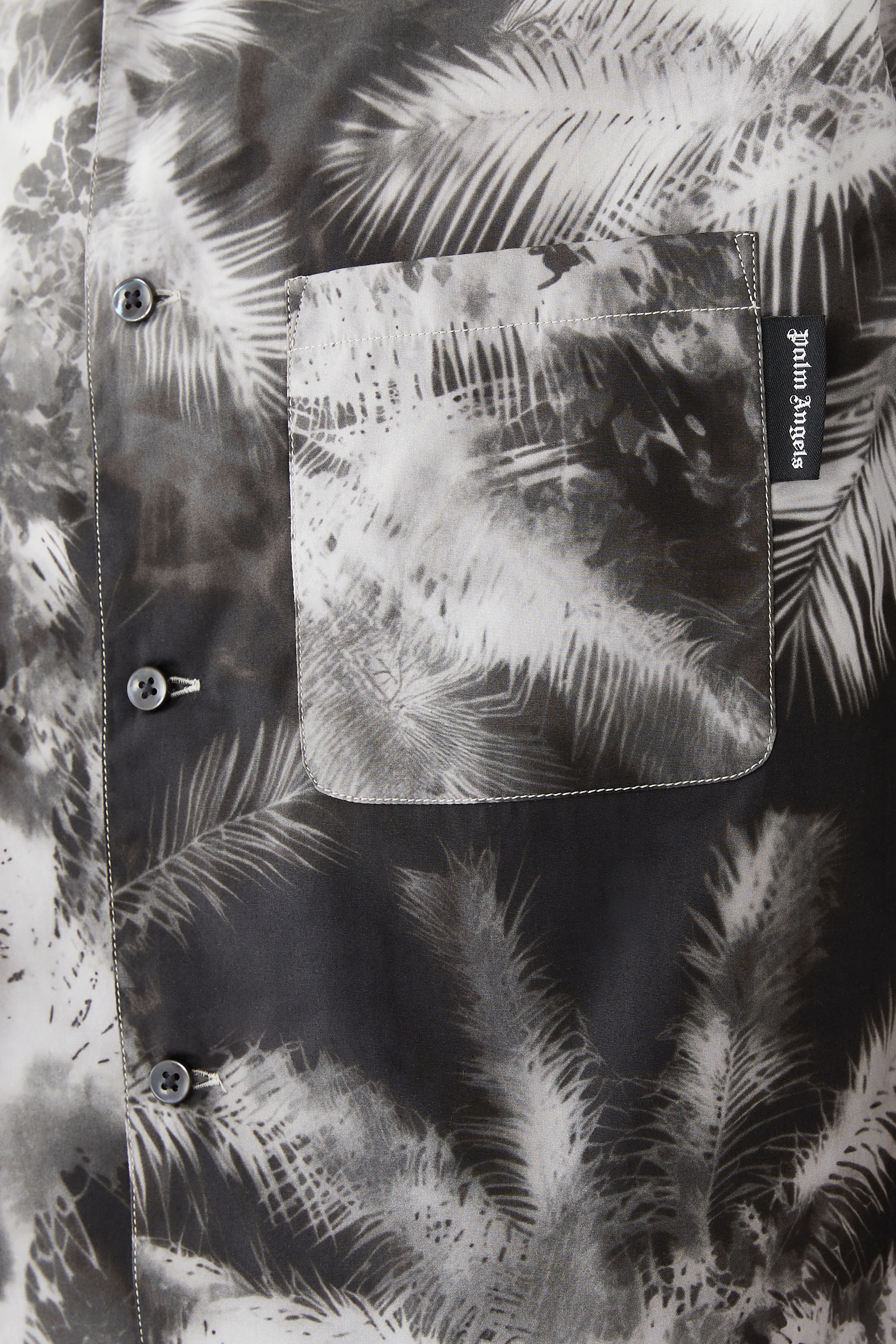 قميص بنقشة نخيل بلون أزرق