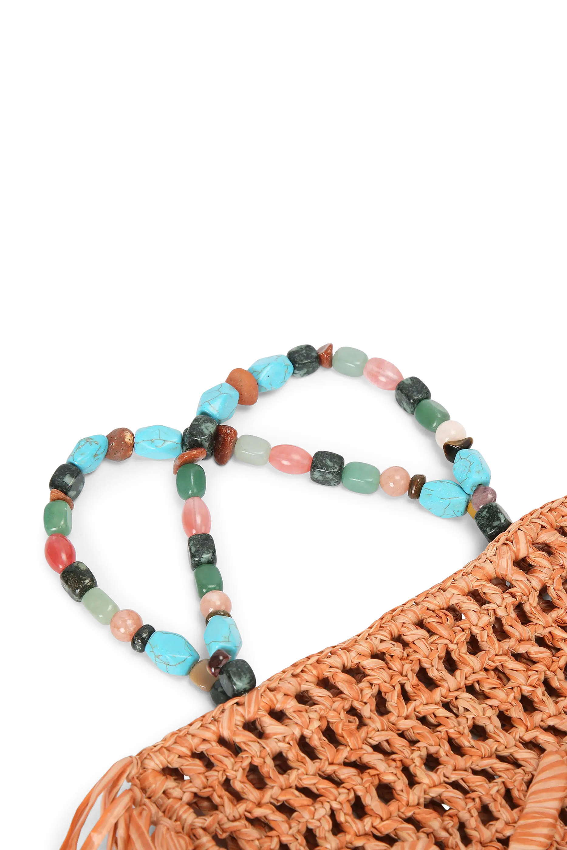 حقيبة يد صغيرة بشرابات