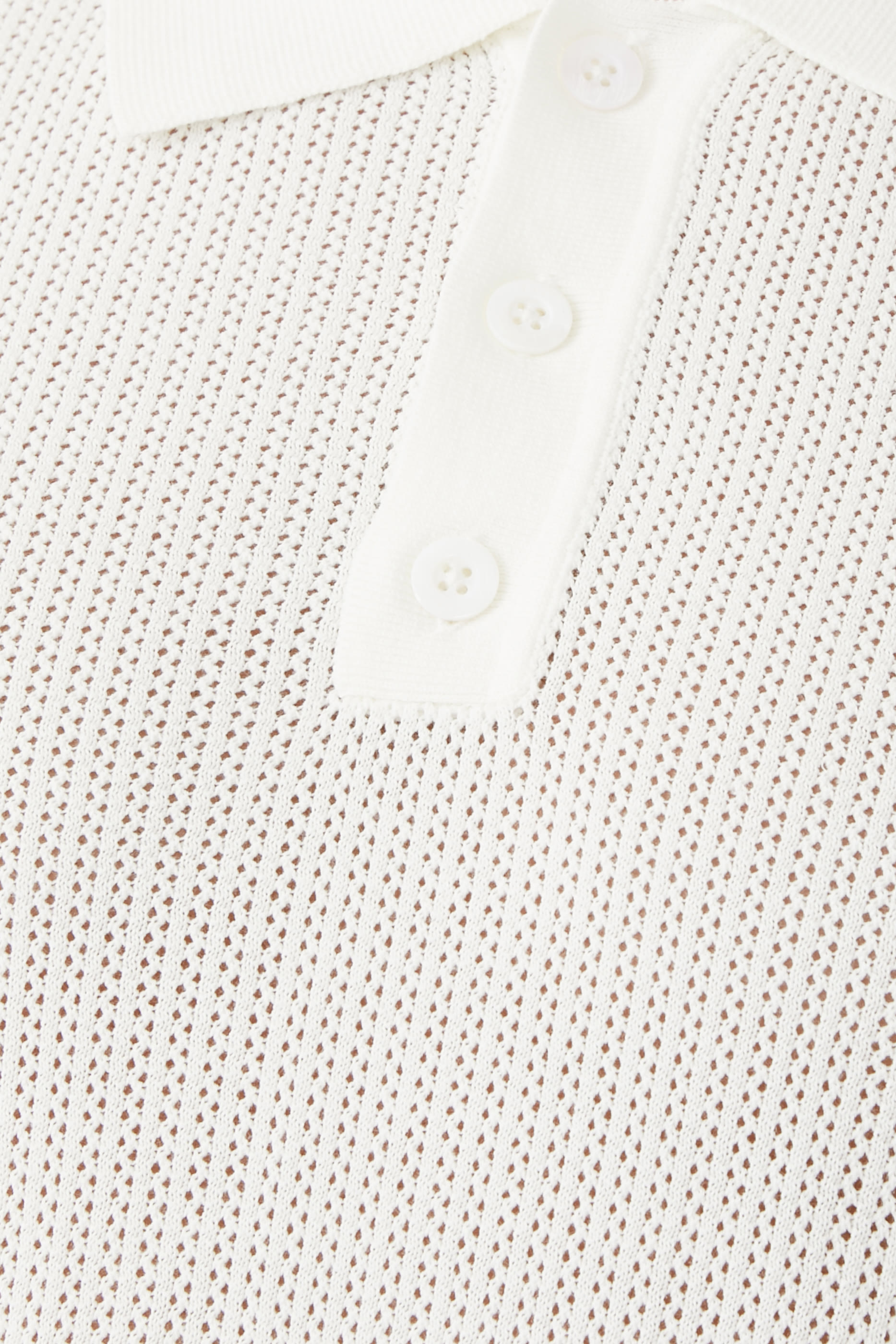 قميص بولو كوين