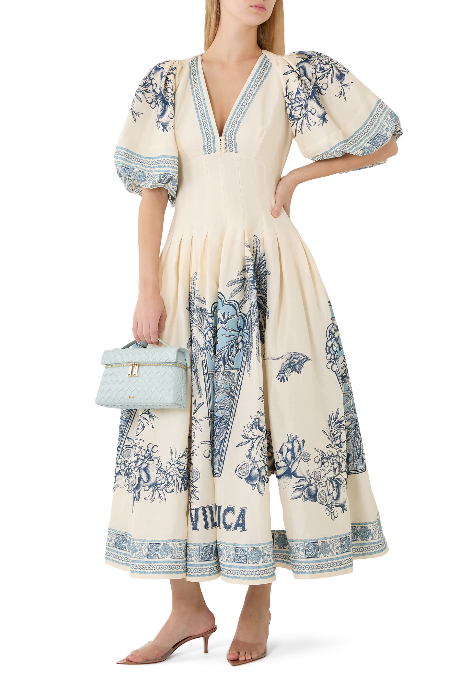 حذاء إيل 55 مفتوح من الخلف بأجزاء شفافة