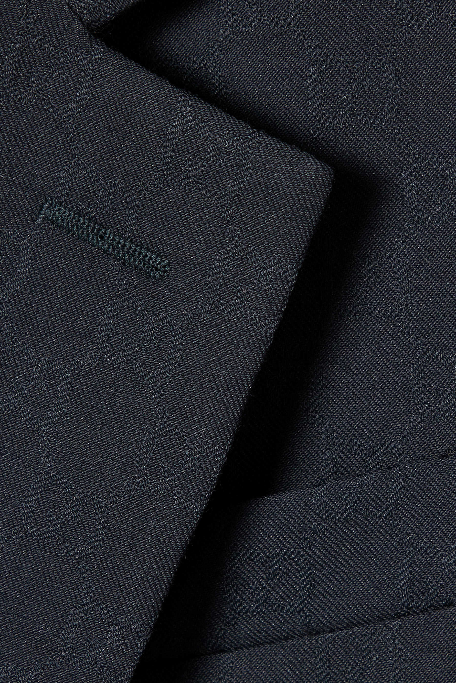 جاكيت بزر ونقشة حرفي شعار الماركة صوف