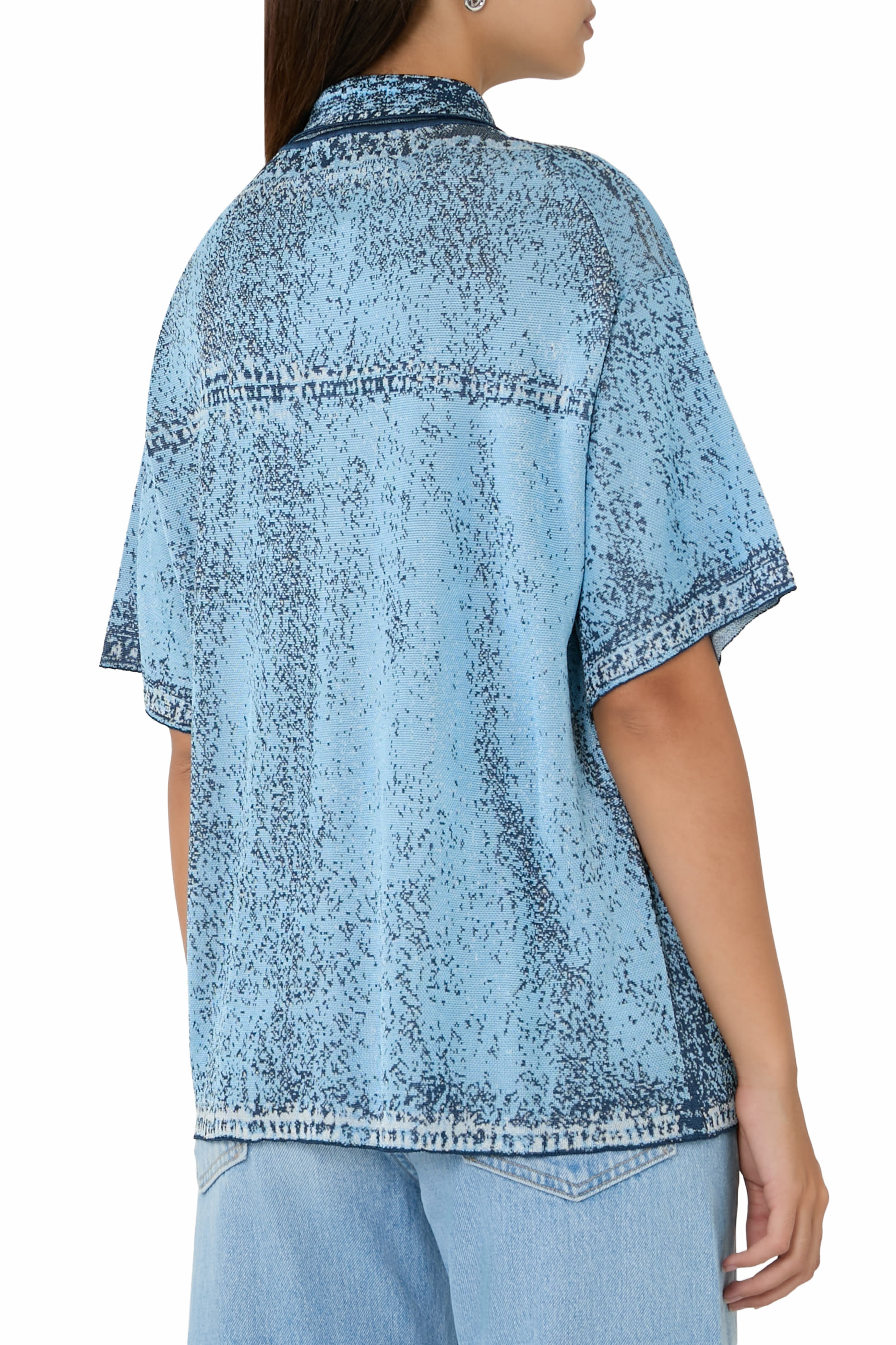 قميص بولو اشر بقصة فضفاضة