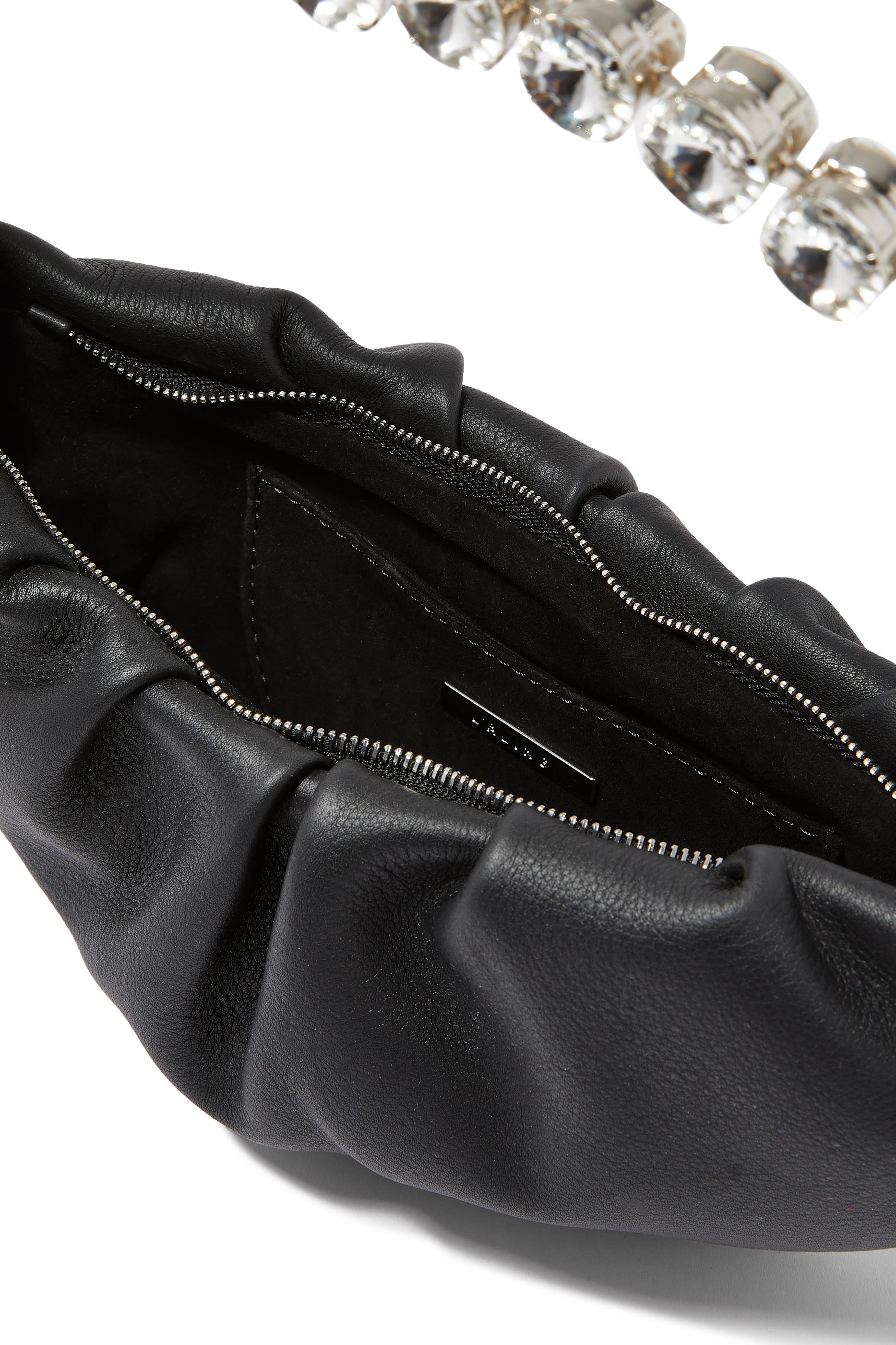 حقيبة صغيرة بتصميم مقوس حقيبة صغيرة بتصميم مقوس