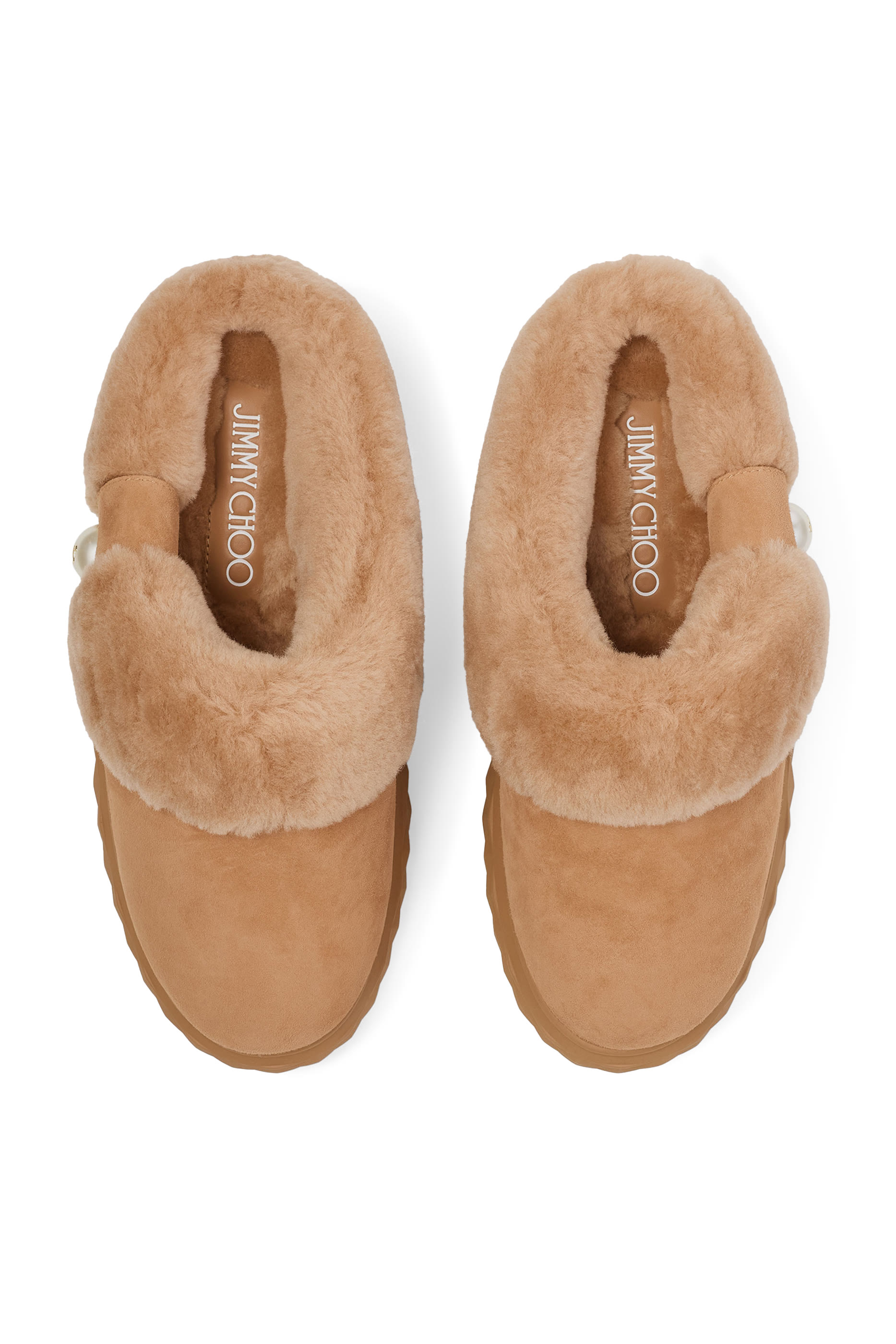 حذاء مفتوح من الخلف بتصميم معينات كبيرة